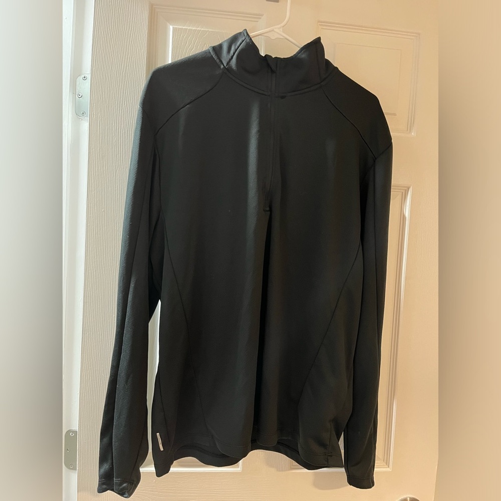 Men’s black MONDETTA 1/2 zippered long sleeve shirt/pull over.